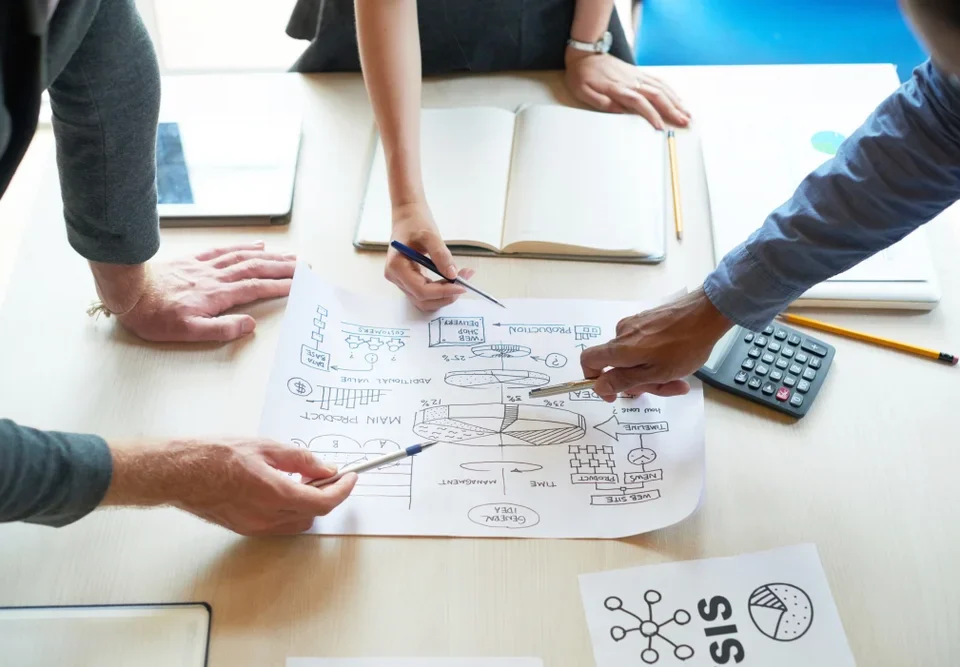 Business team planning strategy at a web development agency in Australia